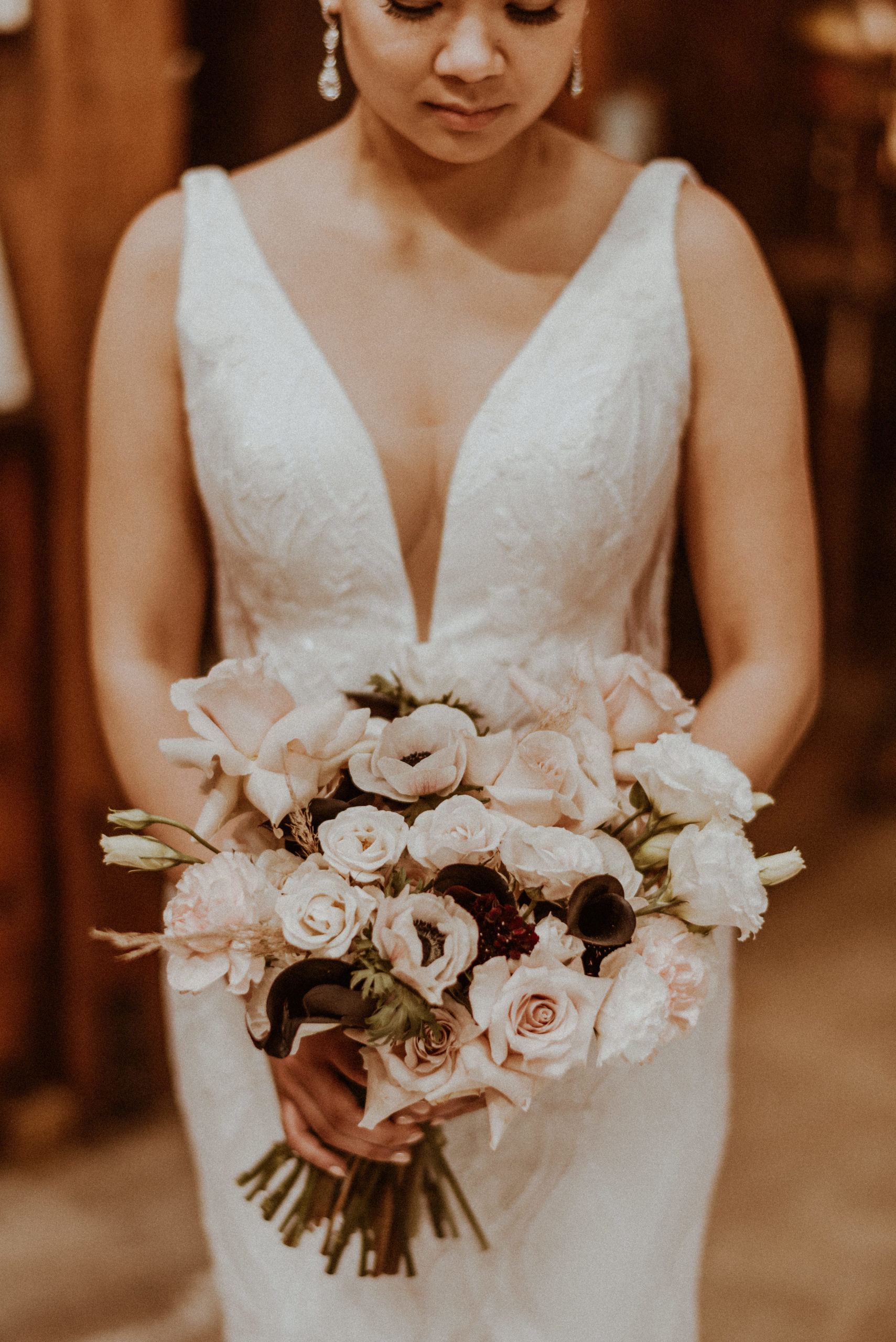 Boston bride with blush floral arrangement