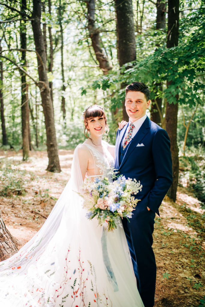 Bride and groom in woods